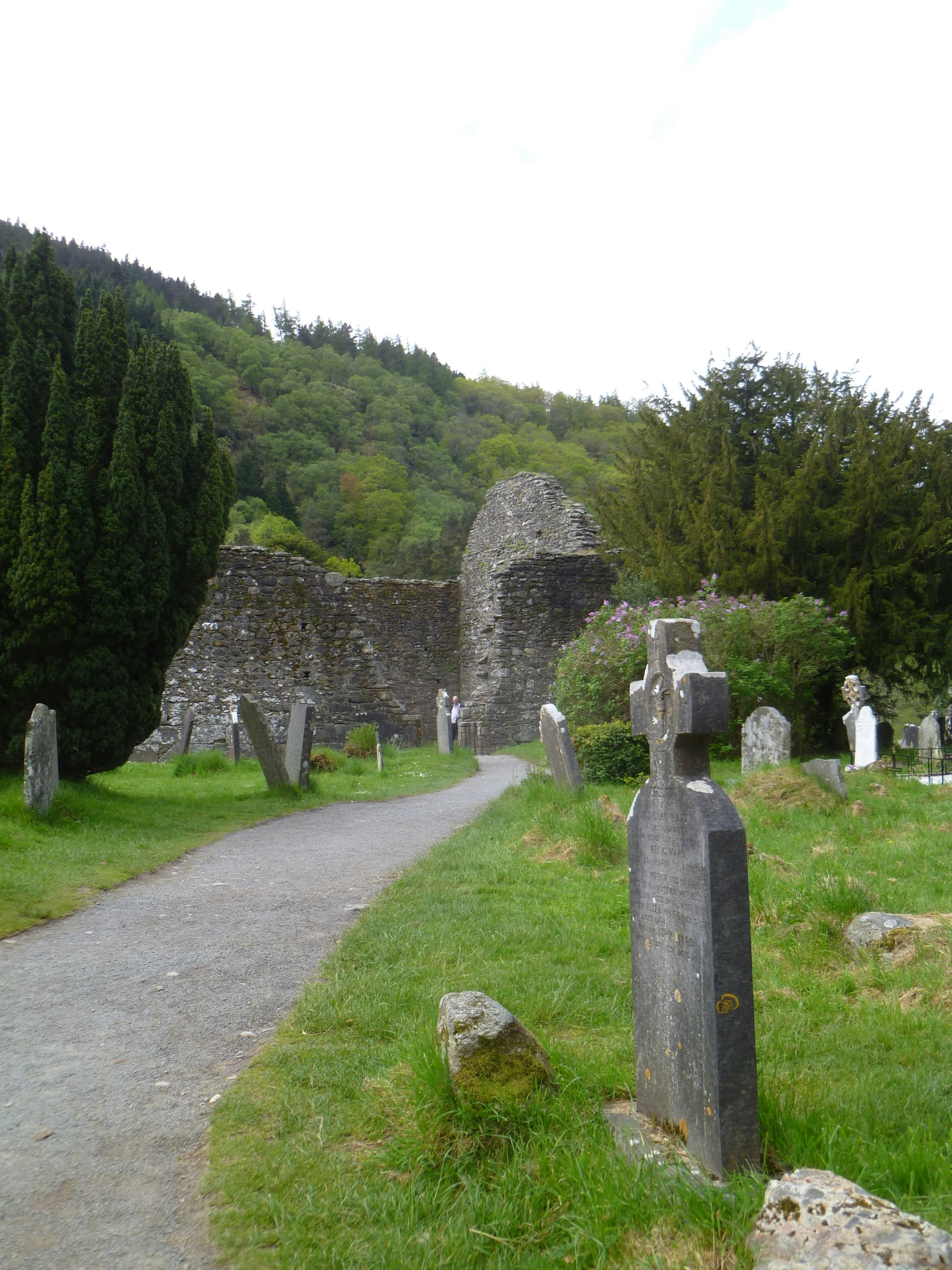 a small road between two ancient tombstones