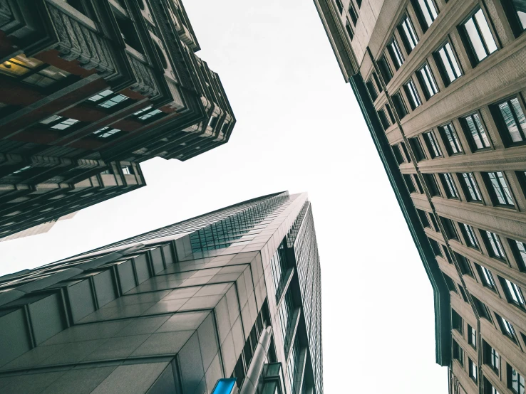 three tall building are seen in this street view