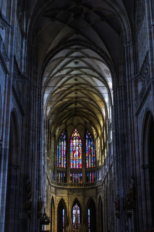 the inside of a large cathedral, with very tall columns