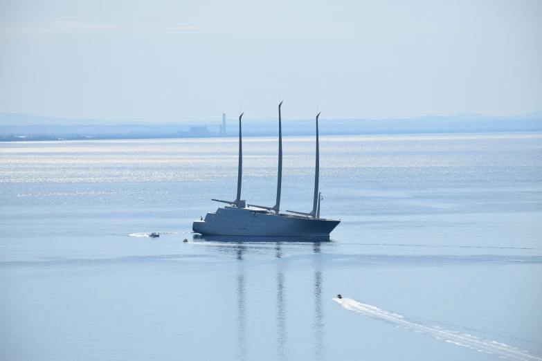 a boat is traveling through the calm blue waters