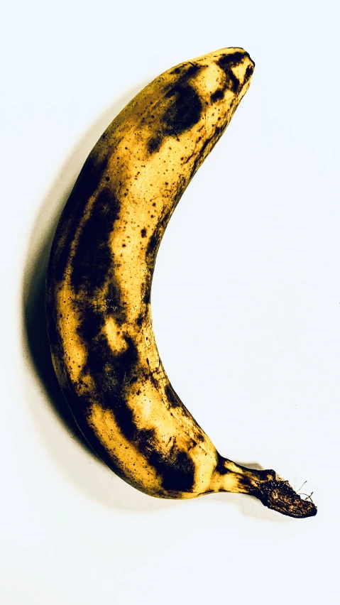 an almost ripe banana is shown in a po