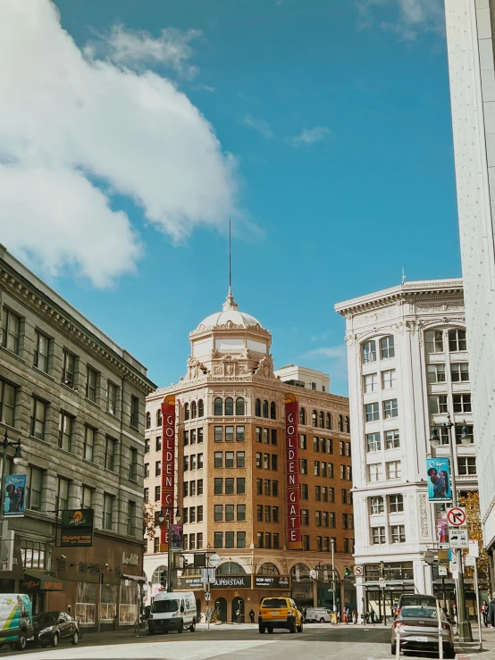 several tall buildings on a city street