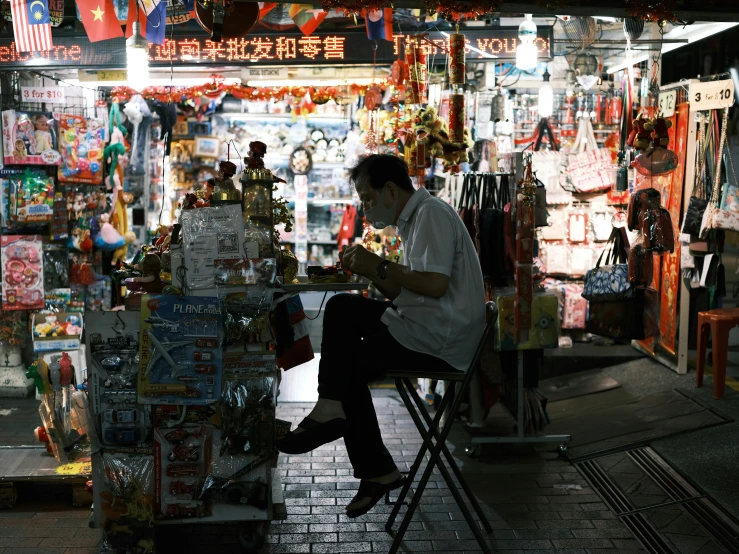 a man is at the store that sells goods