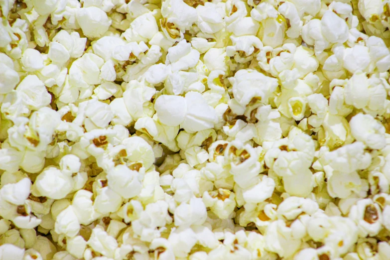 there is a pile of white popcorn