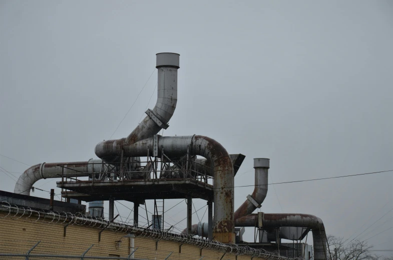 the industrial pipes of an abandoned factory building