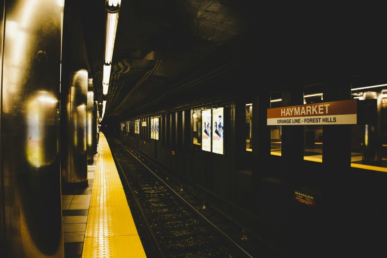 a train that is sitting next to a platform