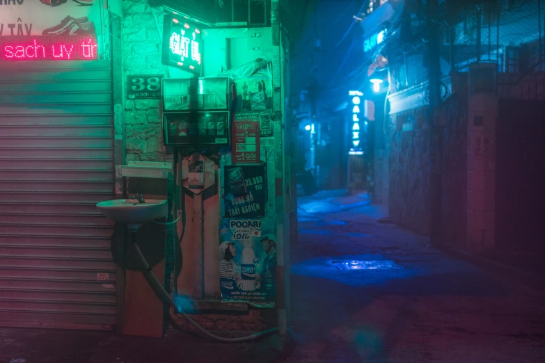 an alley way with multiple neon signs on the building