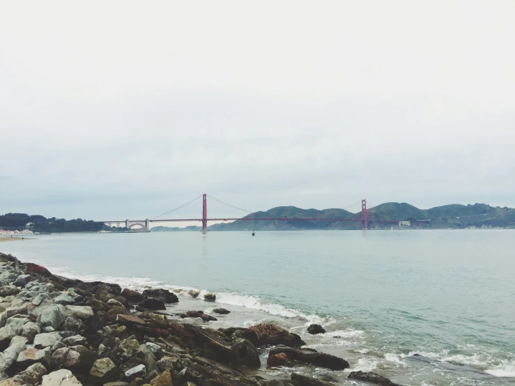 there is a long view of the water from the beach