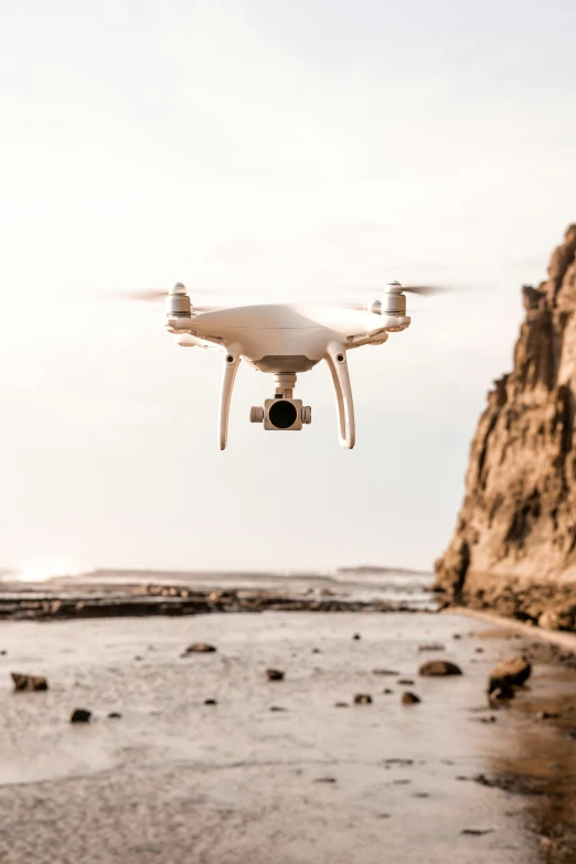 a close up view of a white flying above the ocean