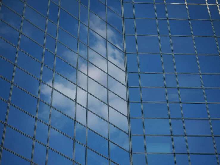 the reflection of a small plane is shown in the windows