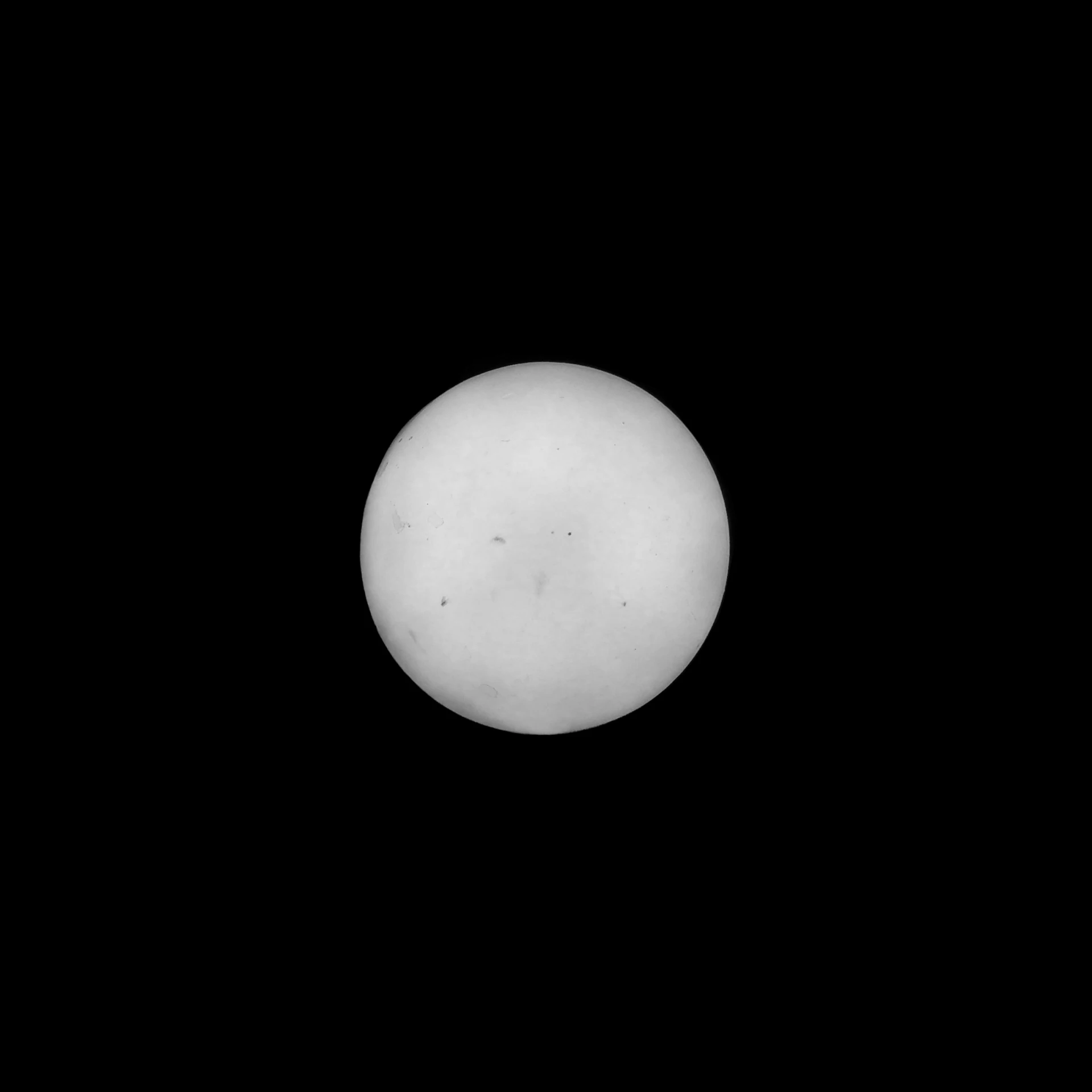 a black and white pograph of a distant object