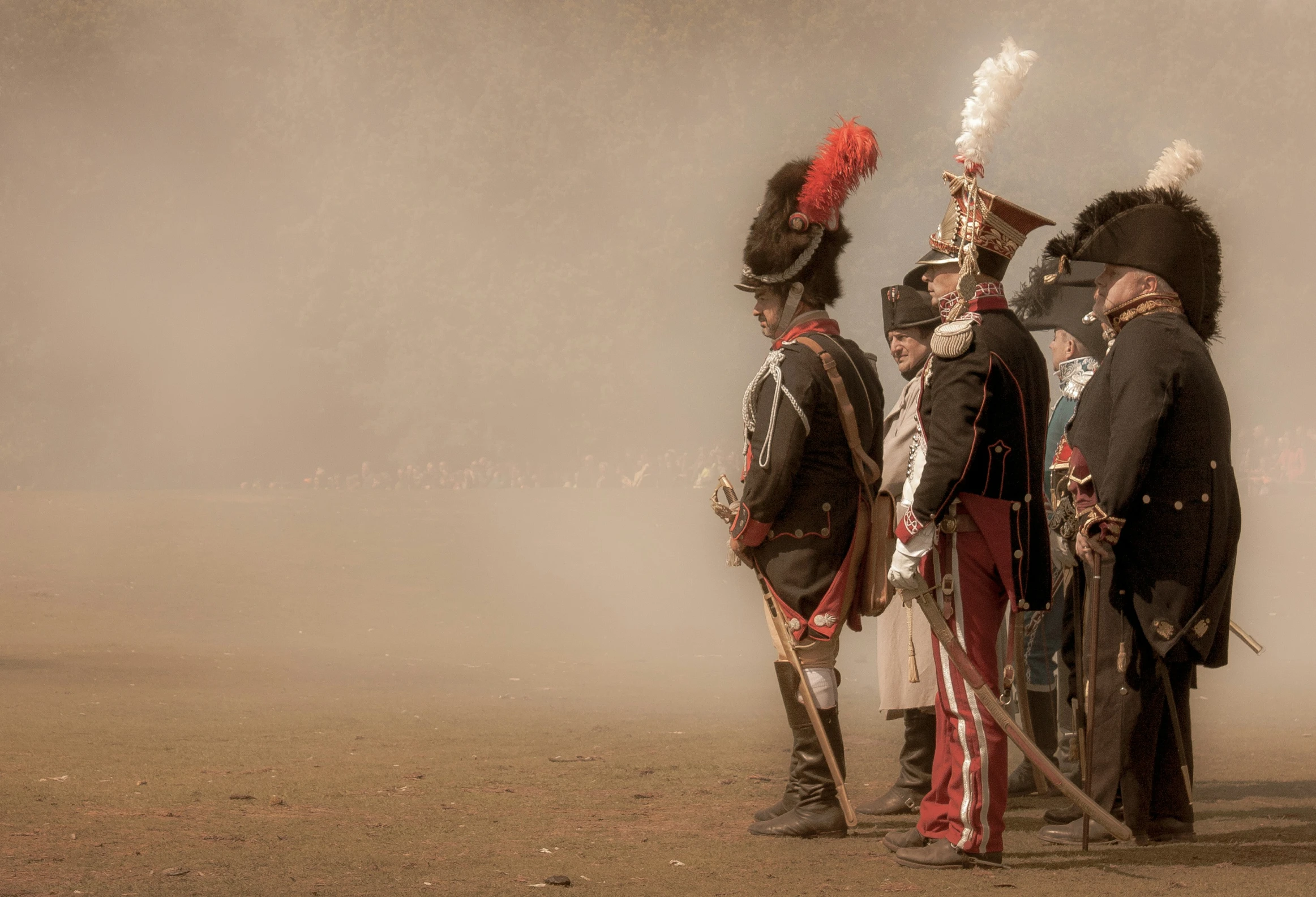 men in uniform prepare to take part in a military display