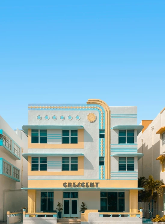 a white and yellow building on a sunny day