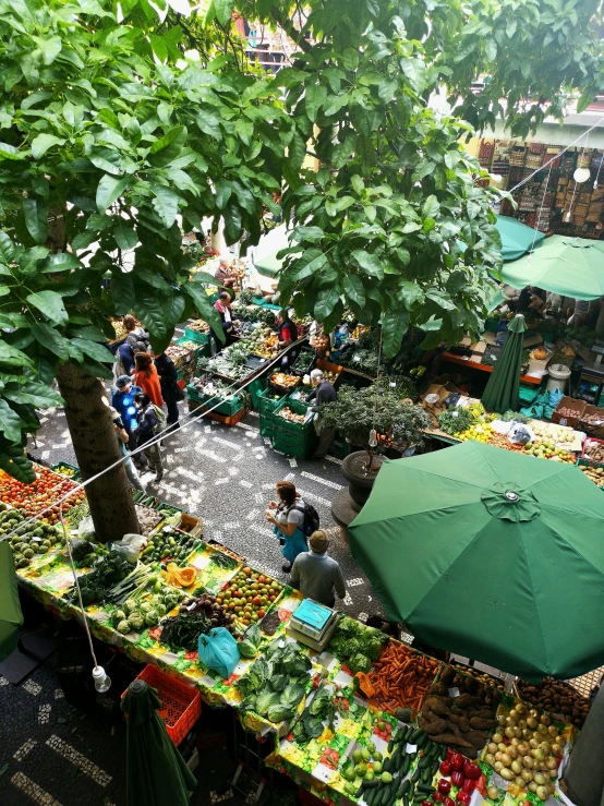 a large open market has many fresh produce in it