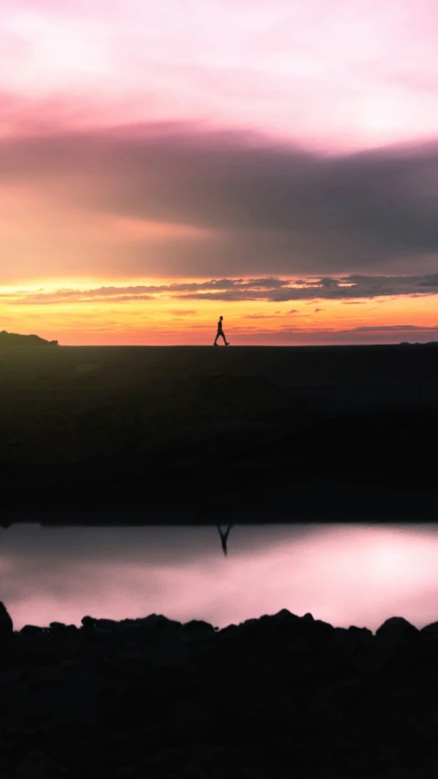 a person on a mountain with a surf board