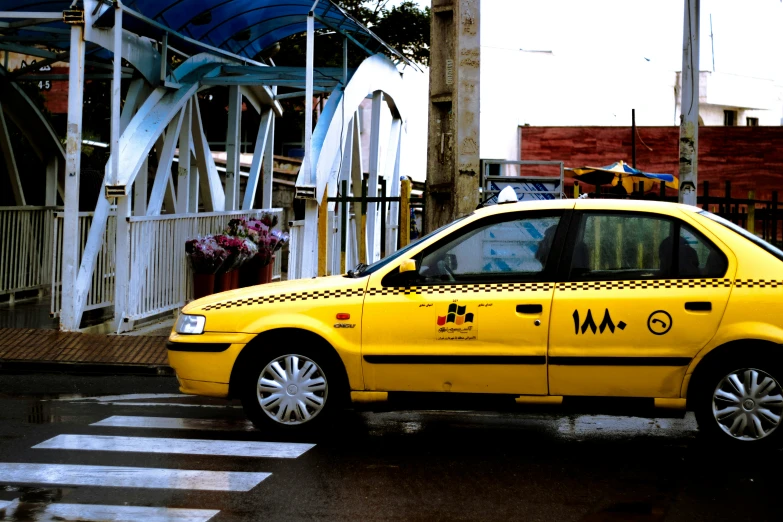 a taxi cab is painted yellow and black