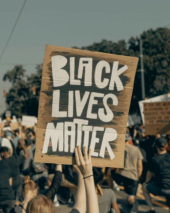 a protest with several protesters and some protesting at an event