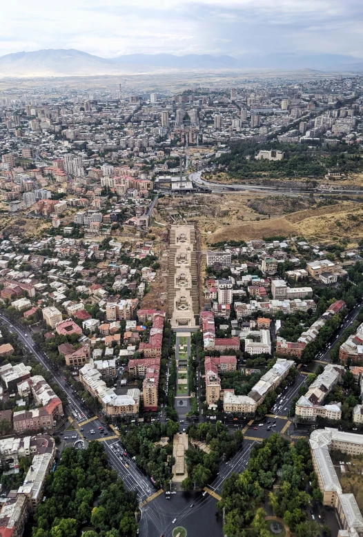 an aerial view of a large city with buildings