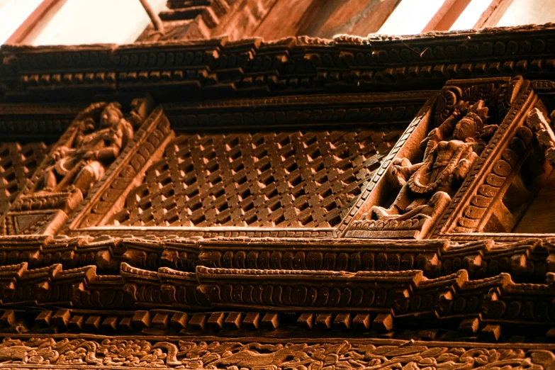 ornate carving made of wood on display at an art exhibit