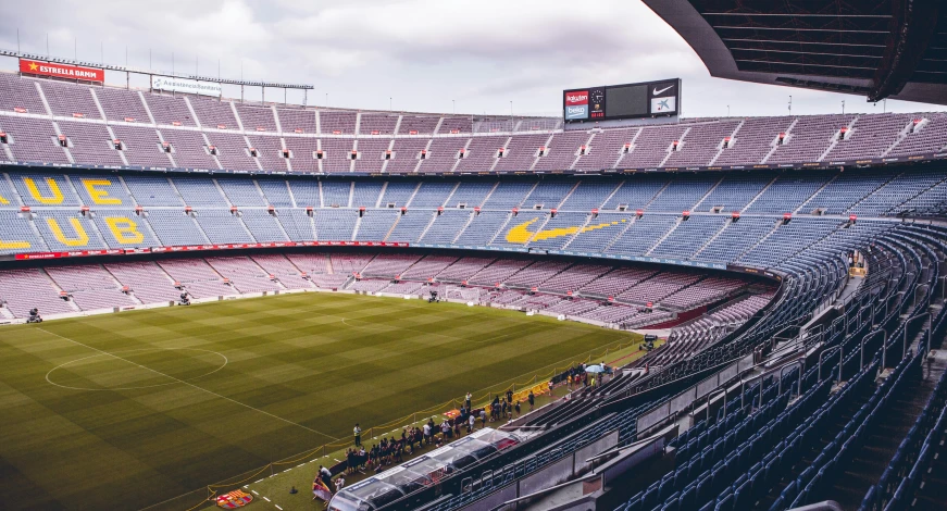 an aerial view of a soccer stadium as it is cloudy