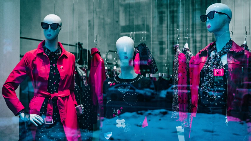 a mannequin's head and display window in a retail shop