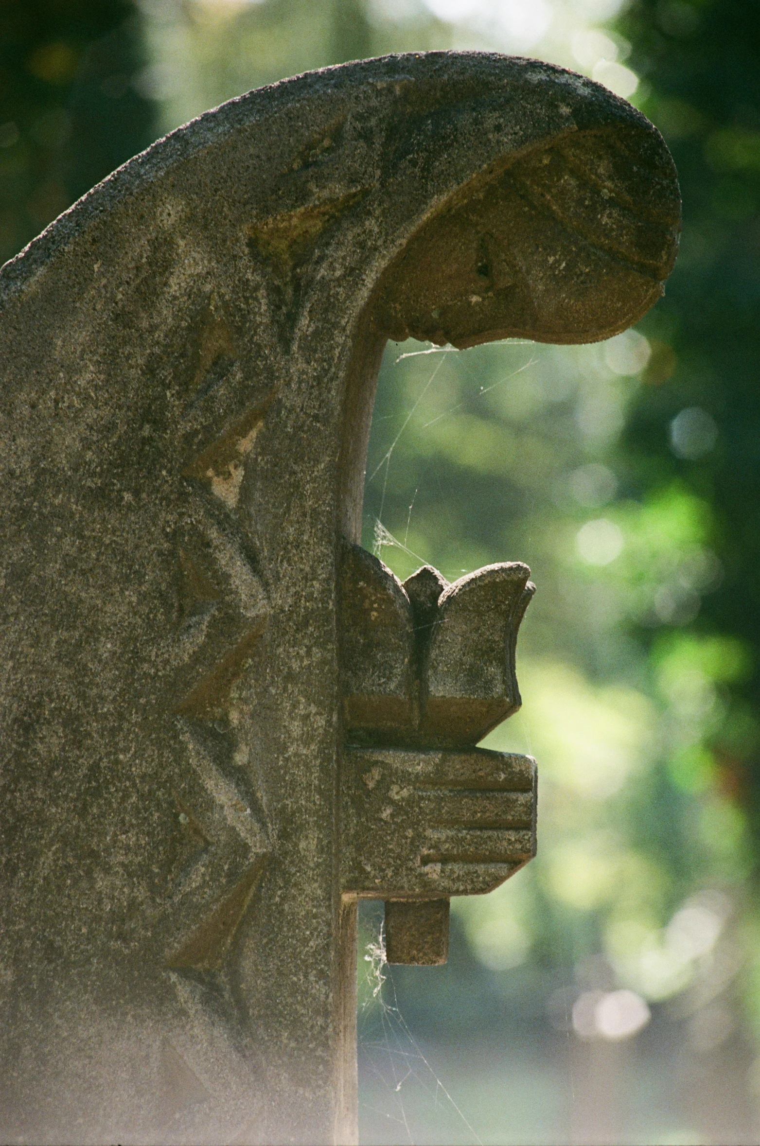 a close up of an ornate, decorative gargoyle