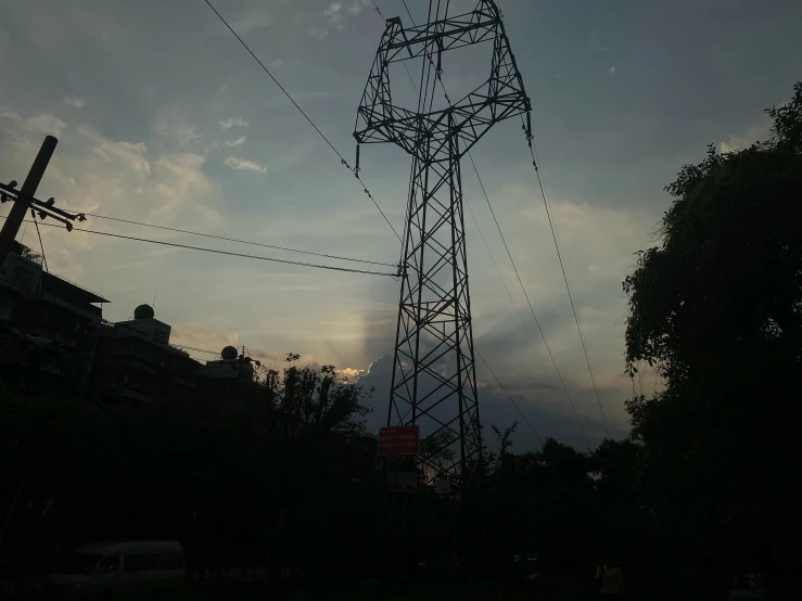 a group of power lines near a building