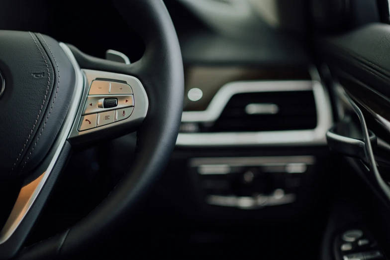 there is a steering wheel on the inside of a car