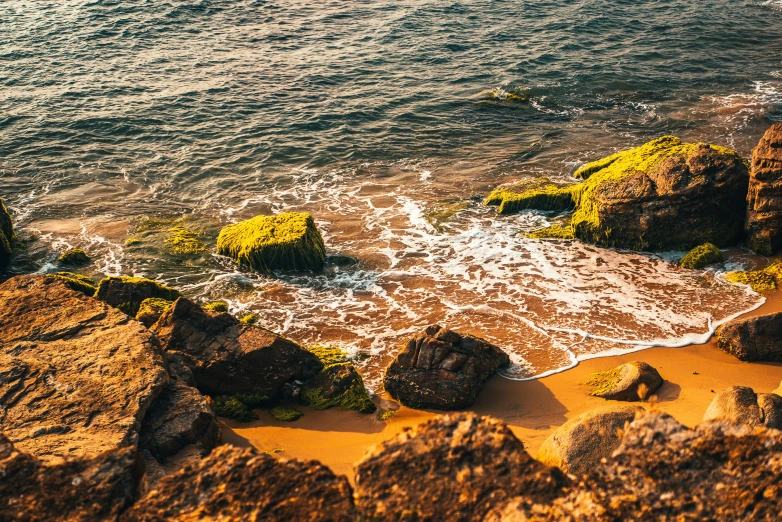 a large body of water surrounded by rocks