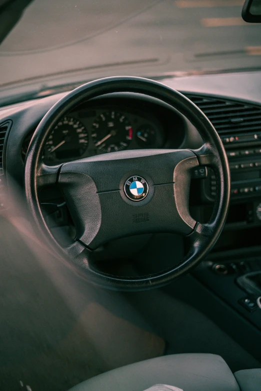 the steering wheel and dashboard of an automobile