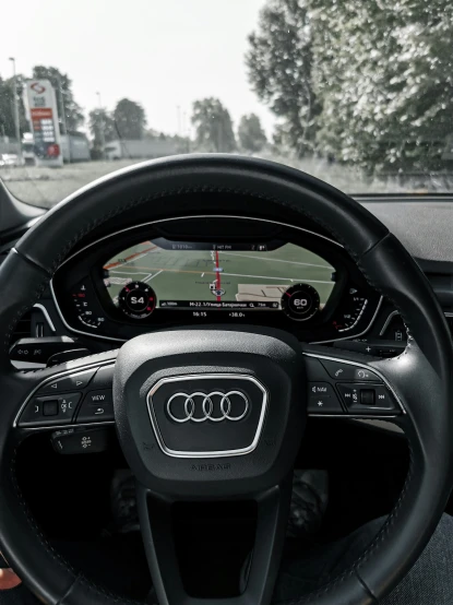 a steering wheel is shown with an electronic display on it