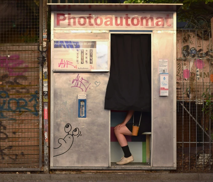 an image of a girl posing in the vending machine