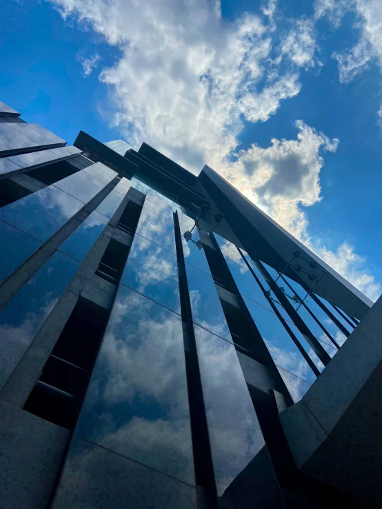 an image of building reflections in water