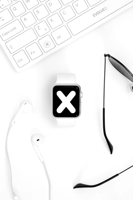 an apple watch has an x symbol in the center