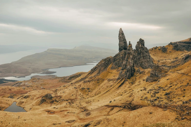 an old building sits on top of a mountain