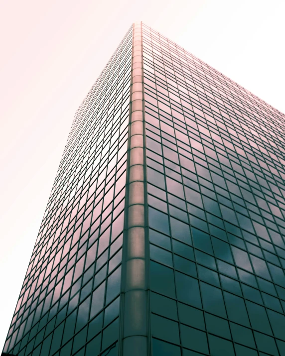 some sort of building with lots of windows and blue sky