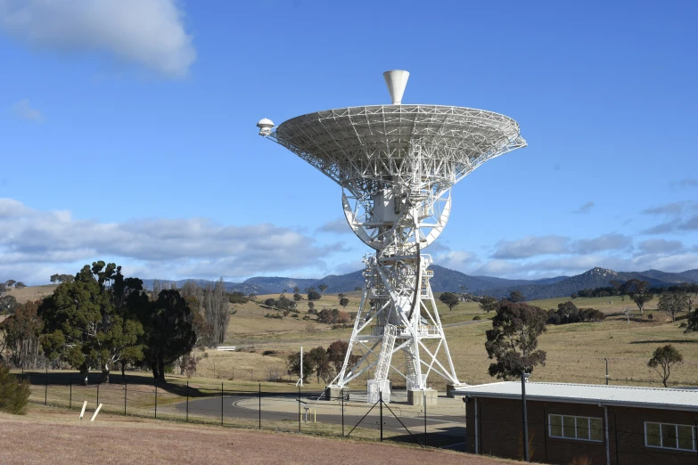 the giant cellular phone signal tower on a hill