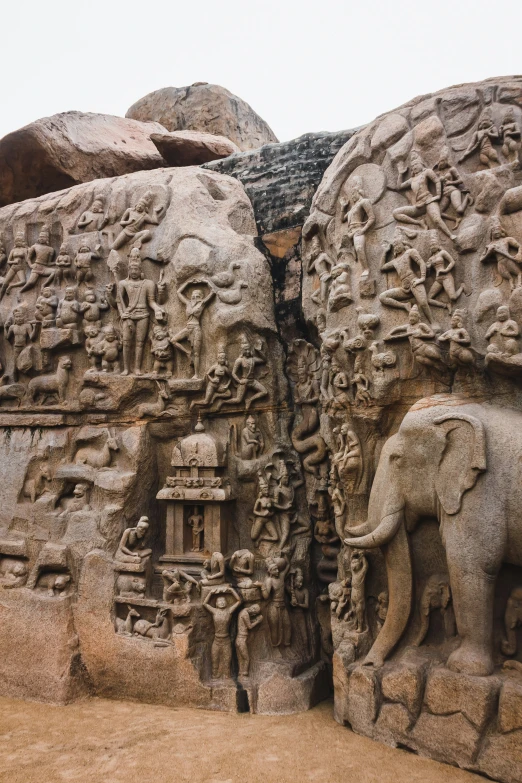 a stone structure with several carvings carved on the sides