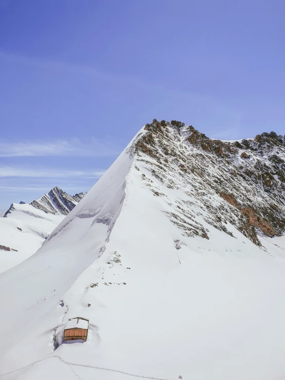 an image of the mountains covered in snow