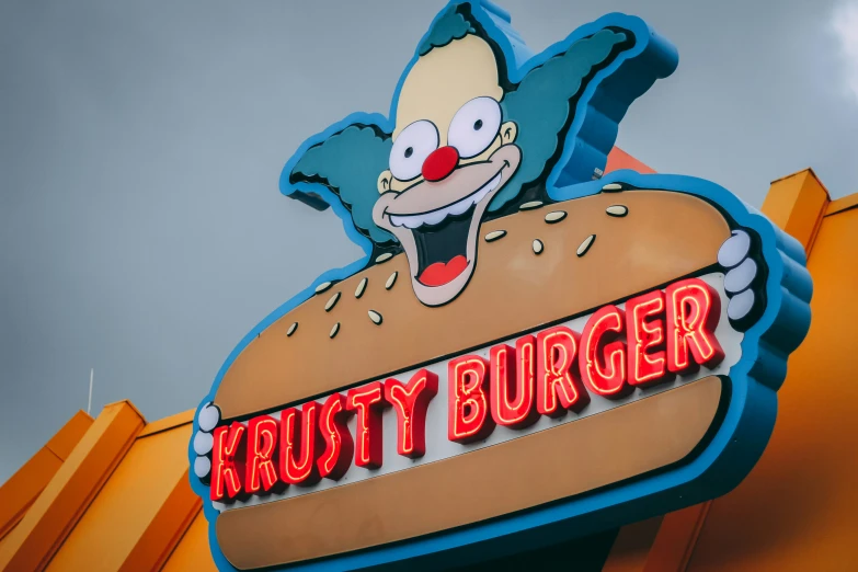 a sign on the side of a building that says krusty burger