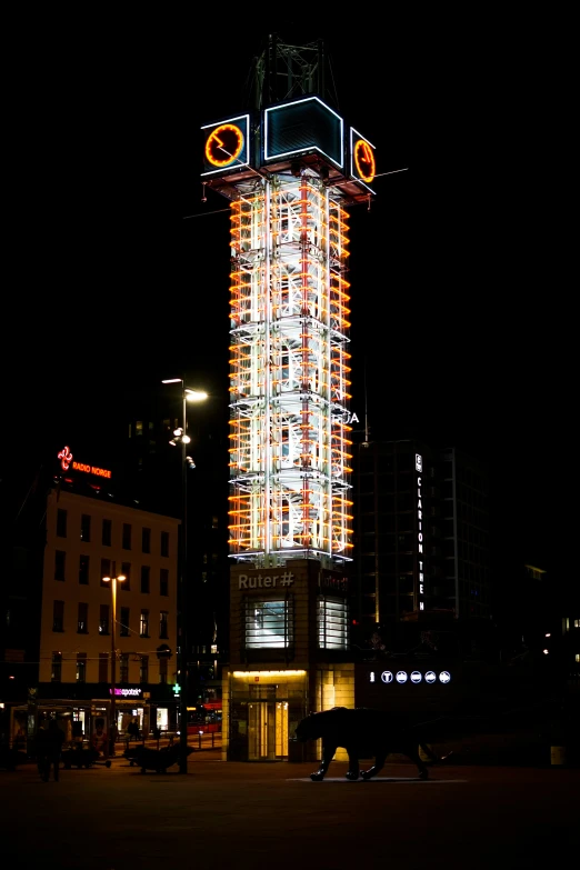 a tall tower with a clock on top of it