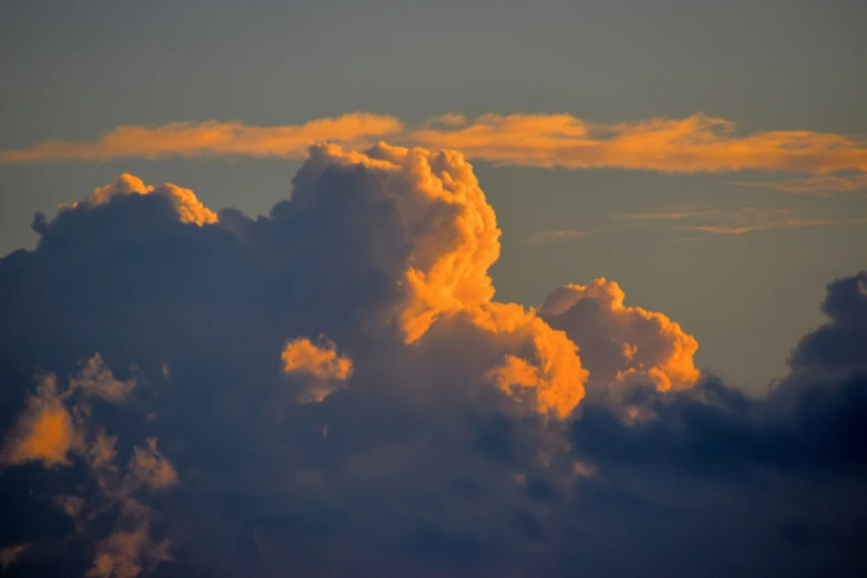 there are clouds that have yellow color in the sky