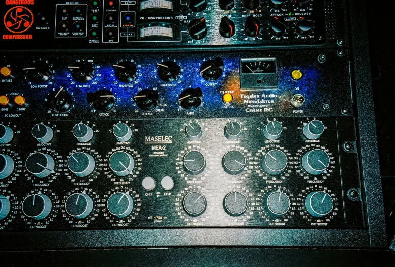 the controls on an analog mixing board