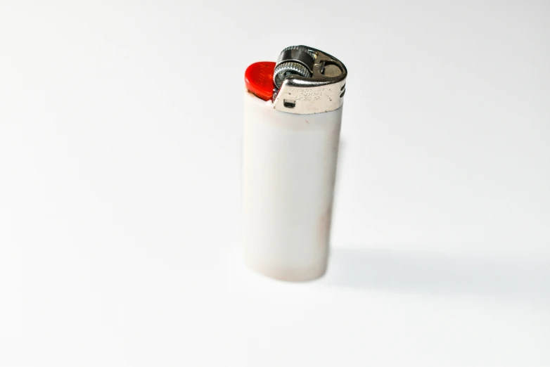 an open lighter is on the table top