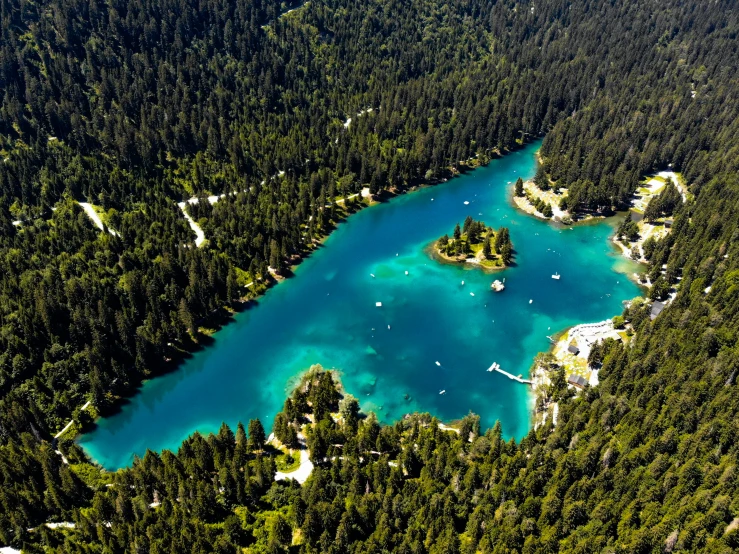 an island with two lakes surrounded by forest