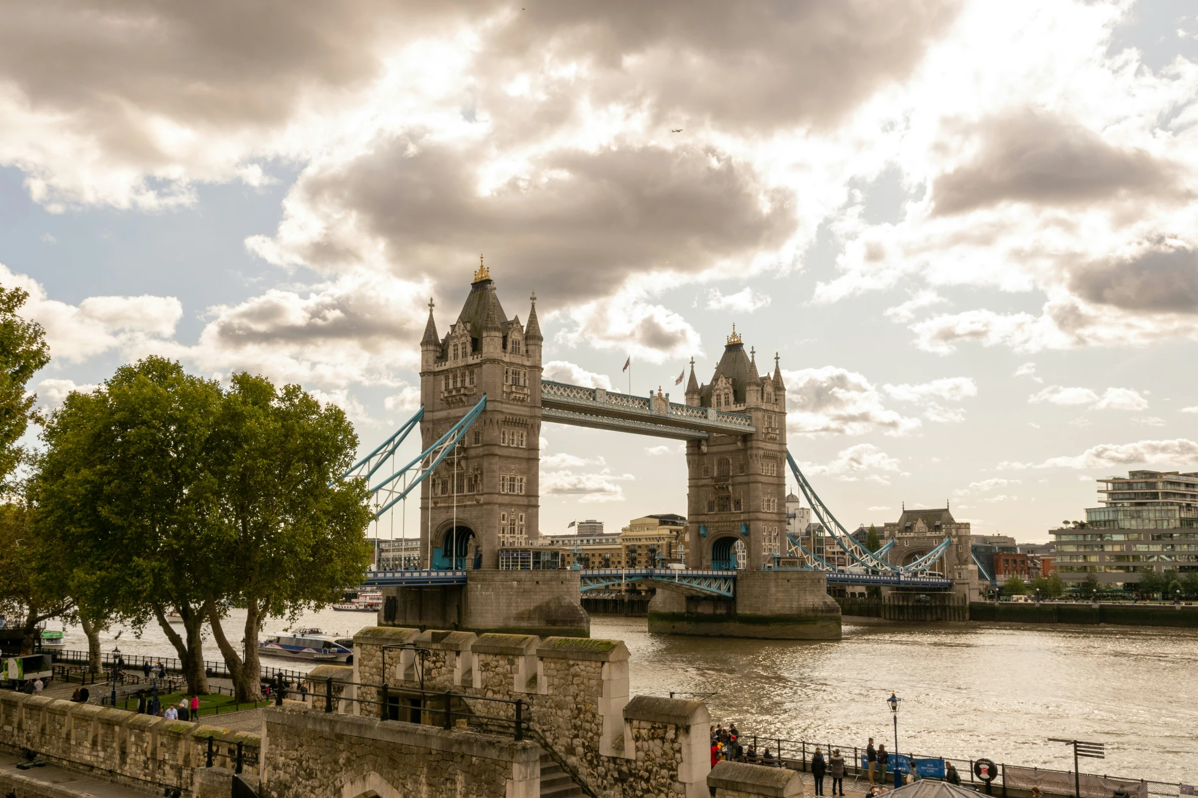 a large long tower bridge spanning over a river