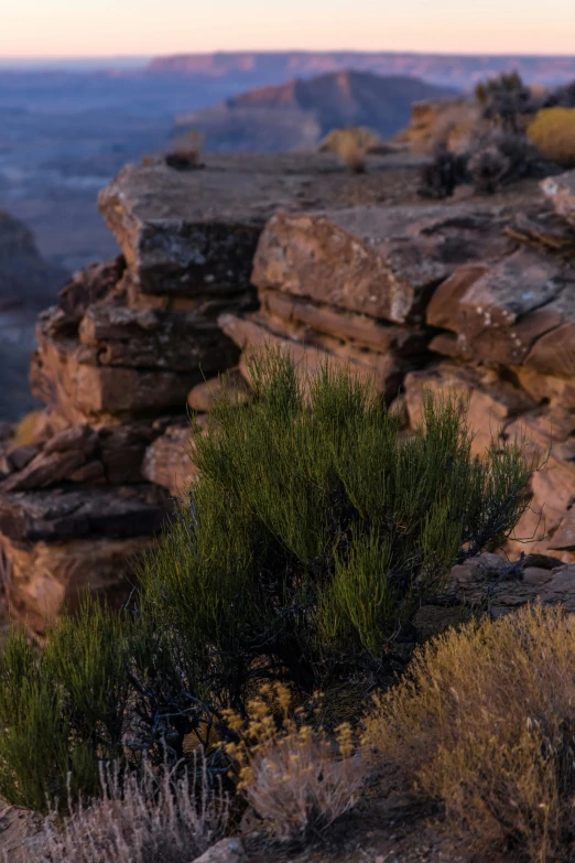 a rock outcropping on the edge of a valley