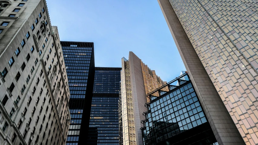 a group of high rise buildings and one of them is the tallest