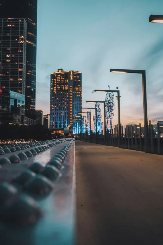 a view of some city skyline with street lights