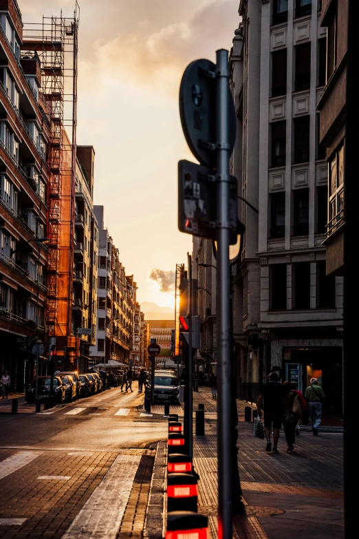 a row of red traffic lights sitting next to a street